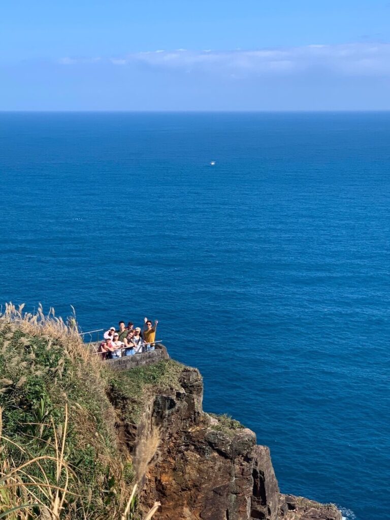 me and my friends on the coast of taiwan in december - no one was wearing a jacket, it was nice and warm that day!